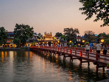 Hoan Kiem Lake and The Huc Bridge in Hanoi at twilight, representing romantic Vietnamese dating destinations