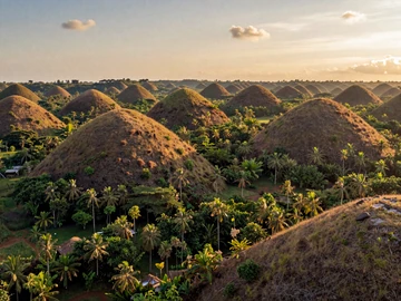 Chocolate Hills Bohol Philippines at golden hour showcasing natural beauty and cultural heritage of the Philippine islands