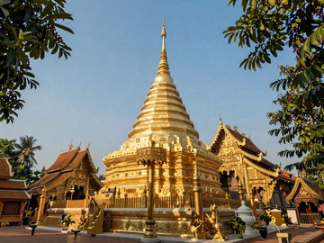 Golden Buddhist temple in Chiang Mai Thailand at golden hour, representing rich Thai cultural heritage important in Thai dating