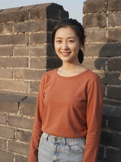Lan, 26, Chinese woman from Xi'an near ancient city wall, interested in cross-cultural relationship