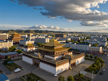 Gandantegchinlen Monastery in Ulaanbaatar surrounded by modern buildings, showing Mongolia's blend of tradition and modernity