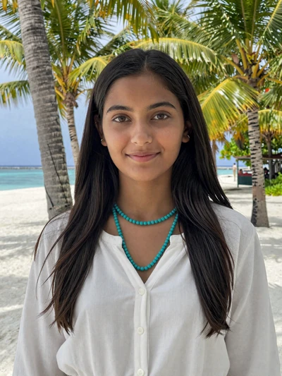 Mariyam, 24, Maldivian woman from Addu City near palm trees, looking for genuine love connection