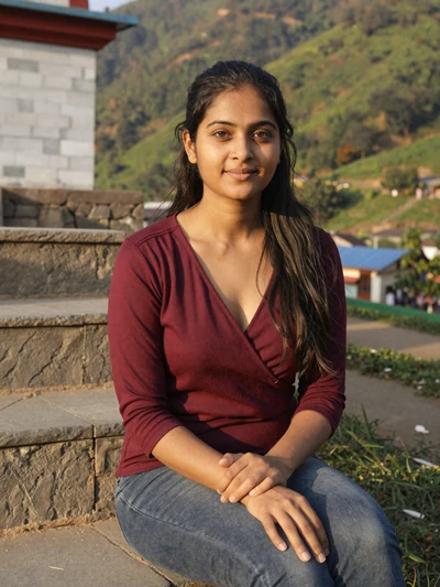 Pratiksha, 27, Nepali woman from Dharan on temple steps, looking for meaningful relationship