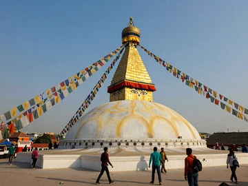 Boudhanath Stupa in Kathmandu Nepal with prayer flags, representing rich Nepali spiritual heritage for cross-cultural dating