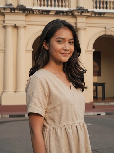 Dian, 26, Indonesian woman from Surabaya near historic building, seeking committed partner