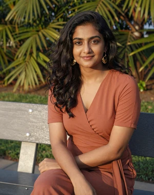 Priya, 31, Singaporean Indian woman from Tampines in terracotta blouse, interested in serious international relationship