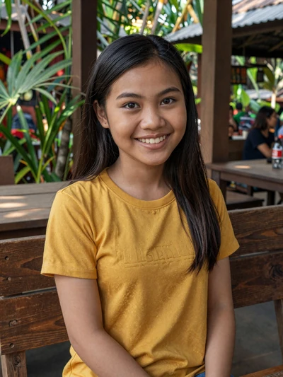 Chanmaly, 23, Cambodian woman from Siem Reap in a garden café looking for genuine connection