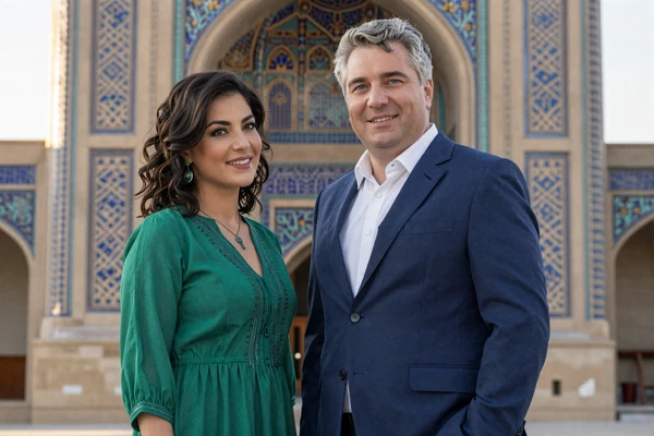 William and Aira, American-Uzbek couple in front of Samarkand architecture, Silk Road dating success