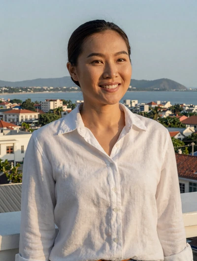 Phương, 30, Vietnamese woman from Vung Tau on coastal rooftop terrace, interested in cross-cultural relationship